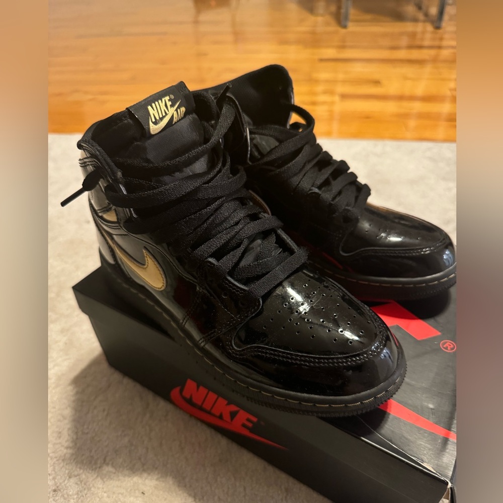 The Air Jordan 1 Retro High OG 'Black Metallic Gold'
